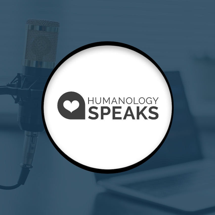 Black and white circle logo design with a heart speech bubble laid over a photo of a microphone